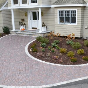 A hardscaped front walkway by Dunning tone & Supply